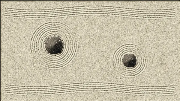 Raked circles around two dark stones in a zen sand garden