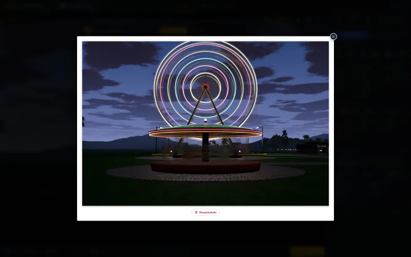 The photo review of an eight-second exposure at ƒ/22: the turning Ferris wheel and the carousel draw rings of light under a blue-hour sky